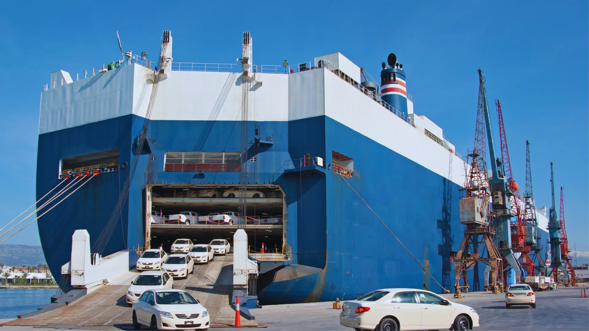 Vehicles being loaded onto a RoRo vessel at the port