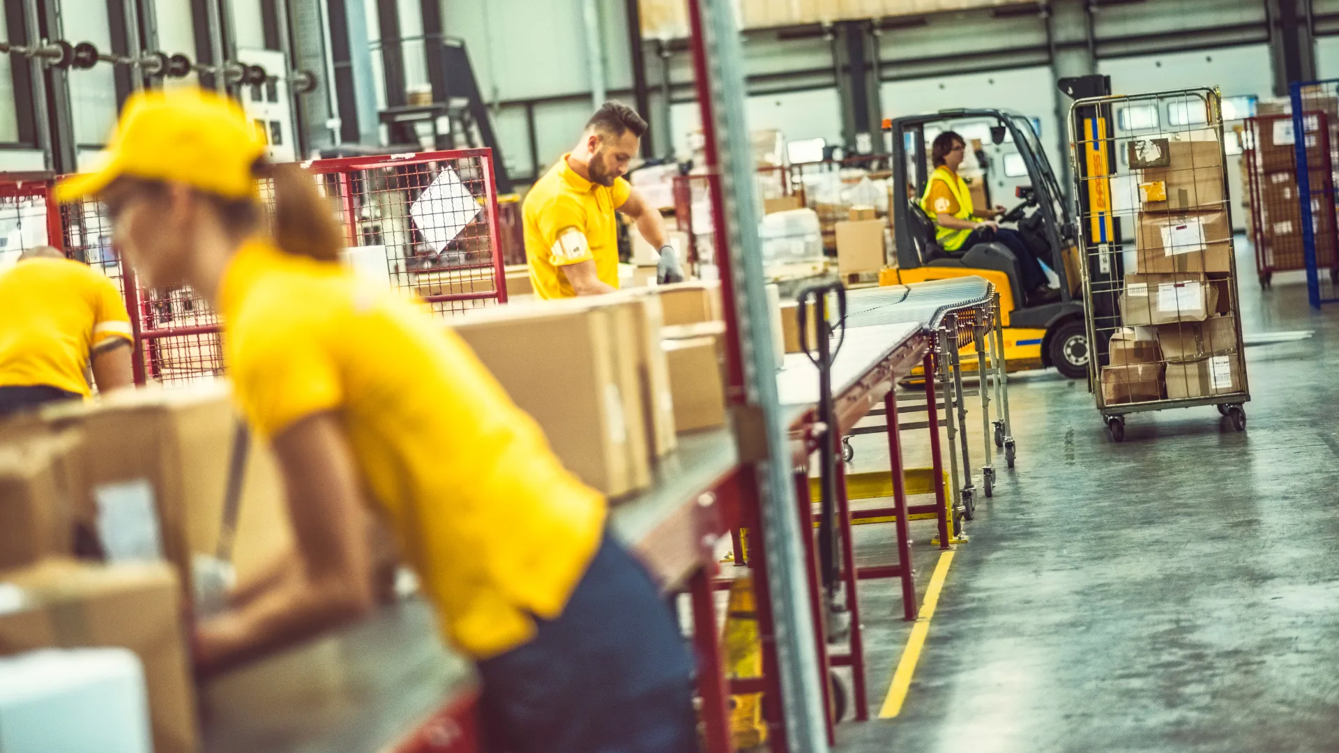 Warehouse team repacking and consolidating cargo on a work table